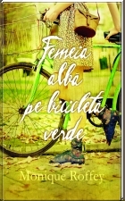 Femeie alba pe bicicleta verde
